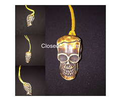 SKULL ON LEATHER NECKLACE